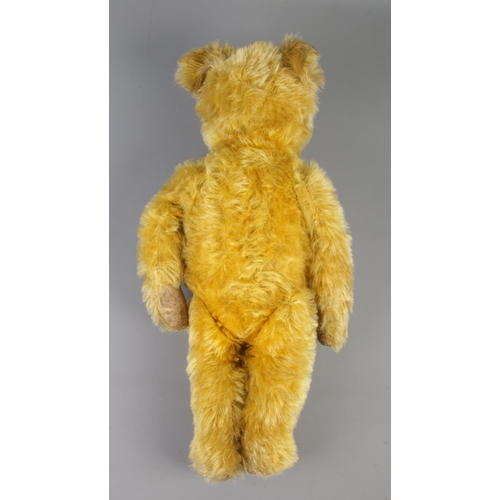 1 - A 1930s Gebruder Bing jointed mohair bear. Seated height 34cm.