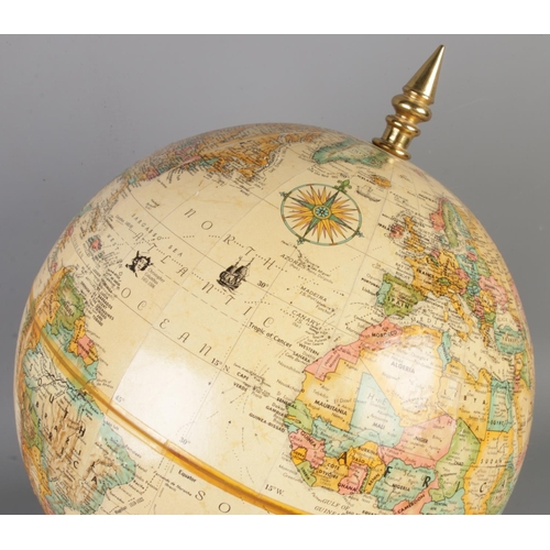 16 - A hardwood based educational globe by Replogle Globes Inc. USA, height 36cm.