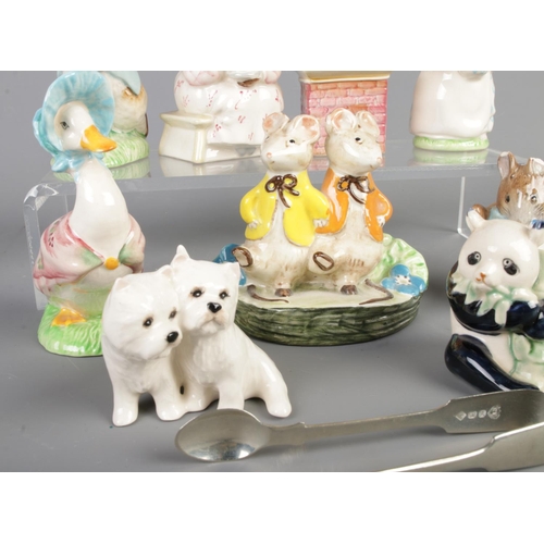 18 - A collection of mostly Beswick ceramic figures to include six Frederick Warne and Co. Beatrix Potter... 