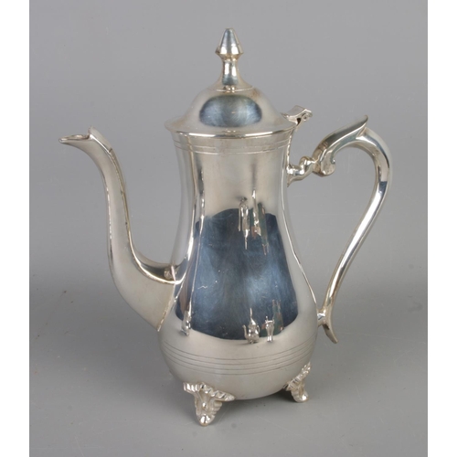 42 - A four piece silver-plated tea set.