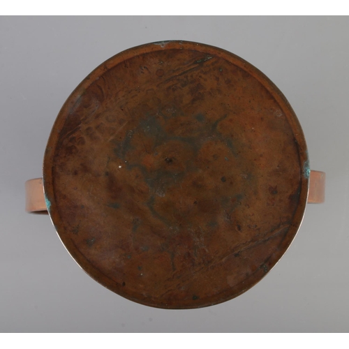 5 - A Newlyn arts and crafts copper twin handled vase featuring hammered fish amongst reeds. Approx. hei... 