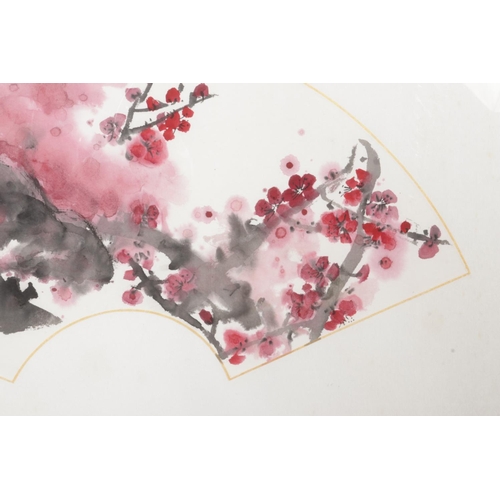 385 - A fan-shaped ink and watercolour painting on segmented paper depicting a spring plum blossom by Chin... 