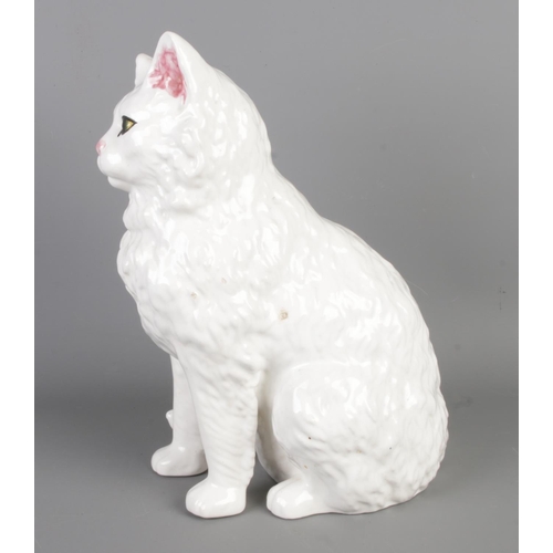 7 - A Casa Pupo Portugal porcelain cat (H29cm) with a pair of 1990s Spanish Casades 