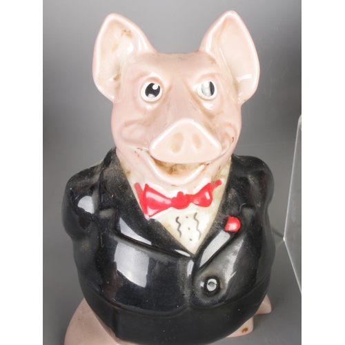 9 - A full set of Wade NatWest piggy banks with original stoppers, tallest 20cm.