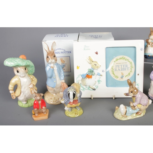 A collection of Peter Rabbit porcelain, including a photo frame ...