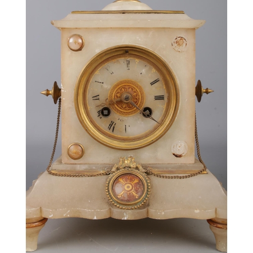 14 - An antique alabaster clock garniture, consisting of urn topped centrepiece, with chain link and cent... 