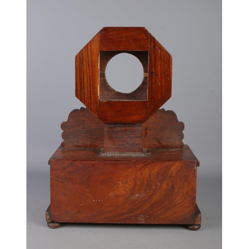 16 - A Nineteenth century rosewood and brass inlaid mantel clock casing of octagonal form, featuring scro... 