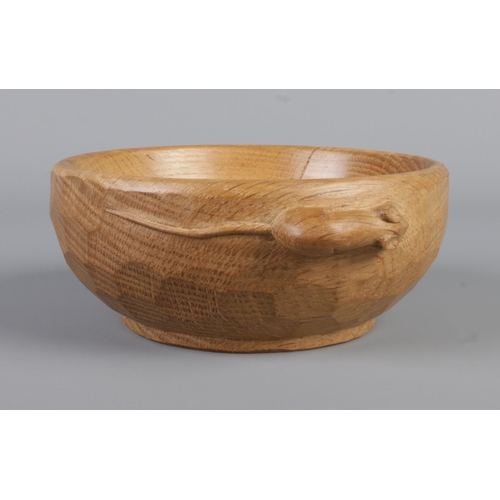 Robert 'Mouseman' Thompson, a carved oak nut bowl, with adzed outer detailing and signature mouse to the body. Diameter: 16cm.