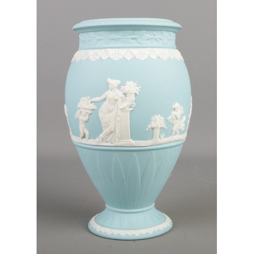 12 - A collection of twenty-eight blue Wedgwood Jasperware items, including trinkets, lidded boxes, vases... 