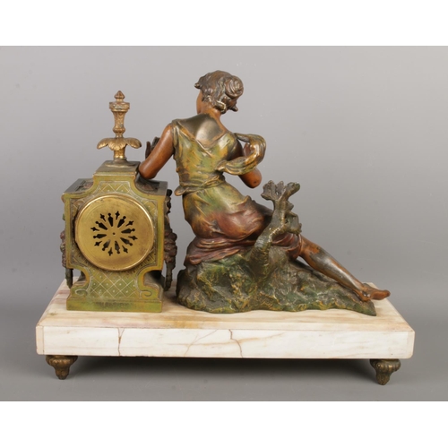 22 - A late 19th century French spelter and marble mantel clock, dial signed 