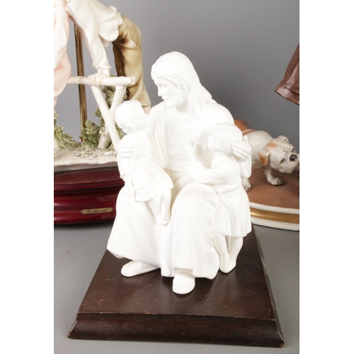 36 - A quantity of assorted ceramic figures to include A. Santini, Brooks & Bentley and several Capodimon... 