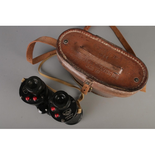 58 - A pair of military Bino Prism No5 binoculars dated 1944 with broad arrow mark in leather travel case