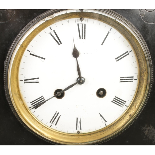 9 - An antique French slate mantel clock, featuring red marble inlays, turned columns, Roman numerals wi... 