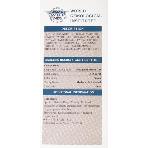 125 - An 18ct white gold emerald and diamond ring. Set with an octagonal cut emerald, flanked by two bague... 