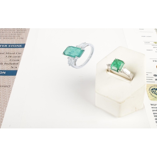 125 - An 18ct white gold emerald and diamond ring. Set with an octagonal cut emerald, flanked by two bague... 