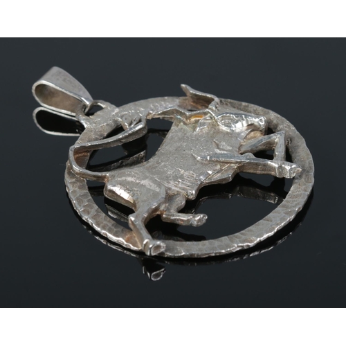 159 - A silver pendant modelled as a bull/Taurus. 5cm x 5cm. 19.29g.