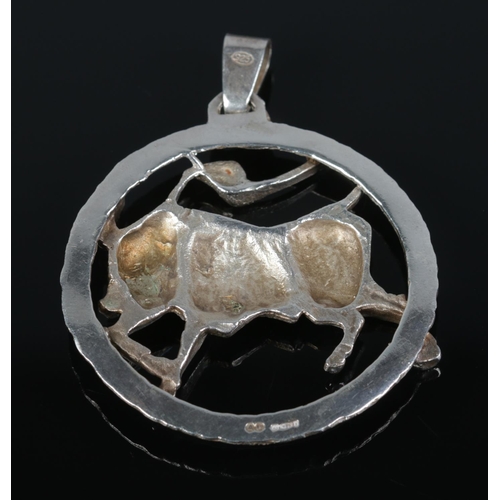 159 - A silver pendant modelled as a bull/Taurus. 5cm x 5cm. 19.29g.