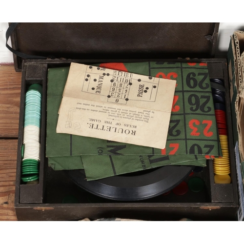 A large box of vintage games, including Totopoly, Monopoly, Tiddlywinks ...