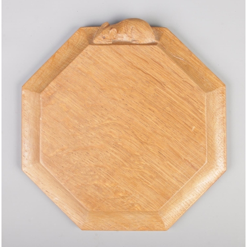 A Robert 'Mouseman' Thompson oak octagonal cheese board/stand