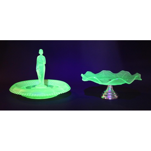 61 - Three pieces of uranium glass, consisting of pedestal cake stand, bowl and figure.