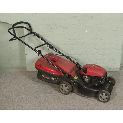 A Mountfield RV40 150cc petrol lawnmower.