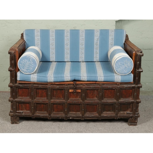 508 - An Indian iron bound box settle/bench with storage compartment under seat.

Hx93cm
Wx140cm
Dx77