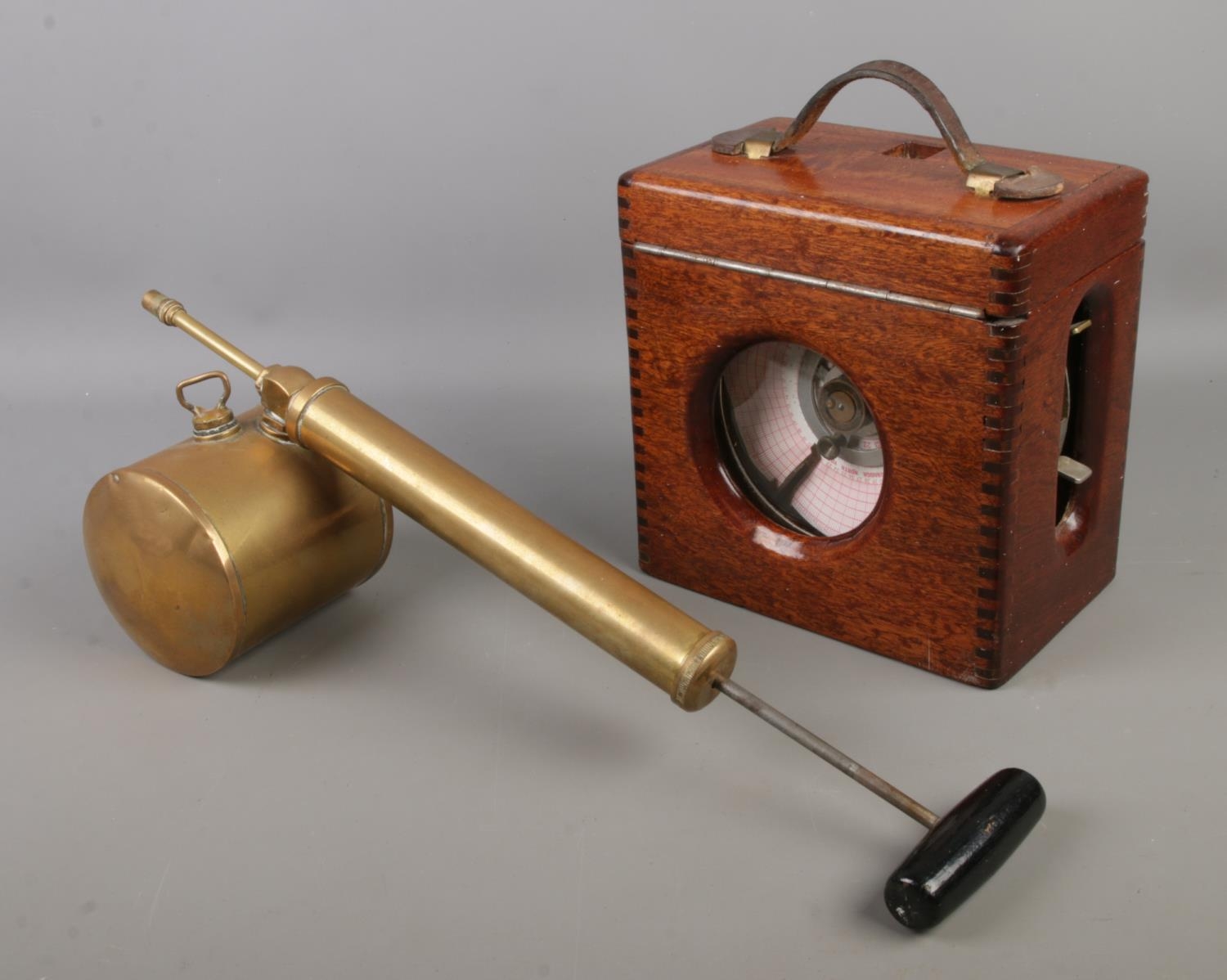 A Toulet Imperator Pigeon Racing Timer Clock in a wooden case alongside ...
