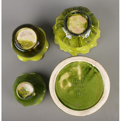 54 - A collection of Bretby jardinières to include example featuring oriental inspired cooking scene. Pat... 