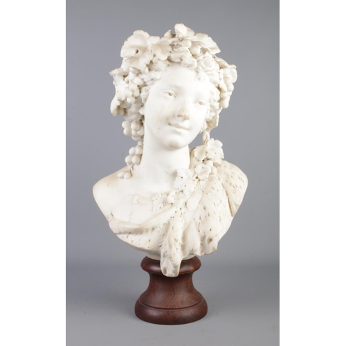 Albert-Ernest Carrier-Belleuse (French, 1824-1887), a carved white marble bust of a bacchante, with hair adorned with grapes and vine branches. Signed A Carrier. Height 49cm.