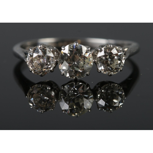 A platinum and diamond trilogy ring. Total diamond approximately 1.75ct. Size P. 2.9g.