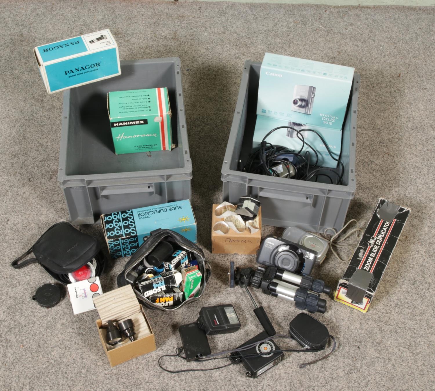 Two boxes of cameras and photographic equipment. Includes two boxed ...