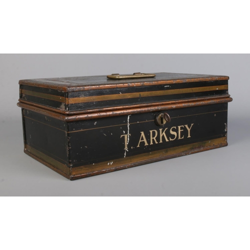 127 - A Milner's of Liverpool metal cash box/strong box. Stencilled for T Arksey. With key. Height 13cm, W... 