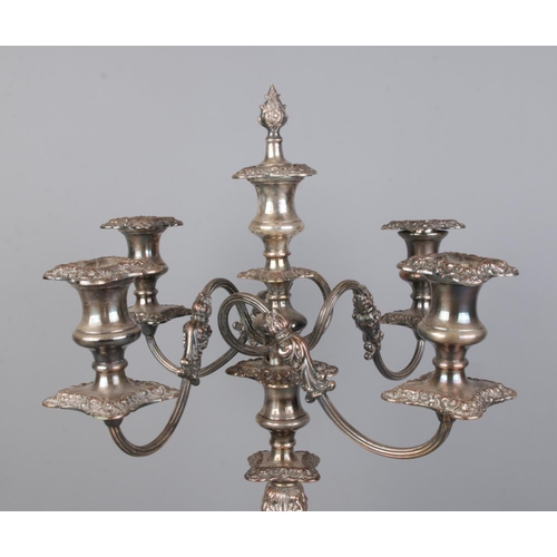 130 - A silver plate on copper five branch candelabra, along with a pair of Barraclough & Sons silver plat... 