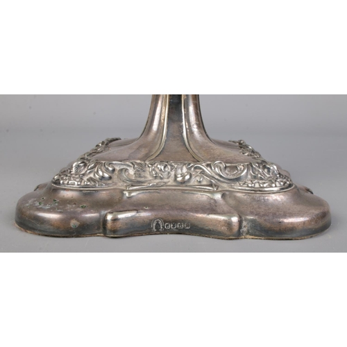 130 - A silver plate on copper five branch candelabra, along with a pair of Barraclough & Sons silver plat... 