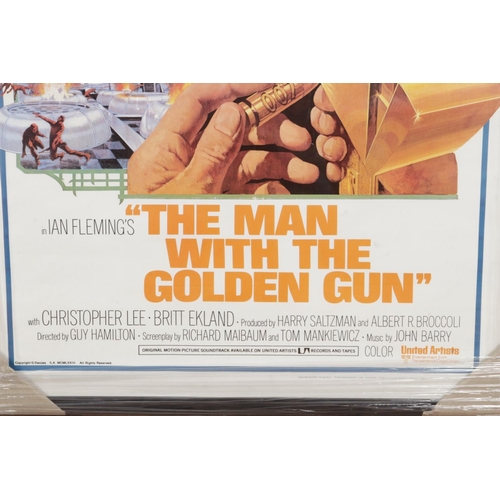 137 - A framed James Bond 007 The Man With The Golden Gun poster. Published by Loeb, copyright 1974. 97cm ... 