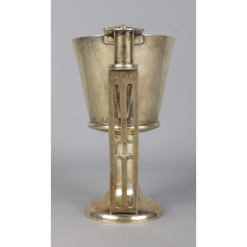143 - An Edwardian Arts & Crafts silver gilt twin handled cup, modelled on Nestor's Cup from Mycenae. With... 