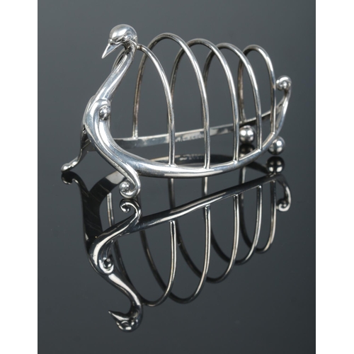 148 - A Victorian silver five bar toast rack modelled as a swan. Assayed Birmingham 1899 by William Hutton... 