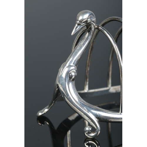 148 - A Victorian silver five bar toast rack modelled as a swan. Assayed Birmingham 1899 by William Hutton... 