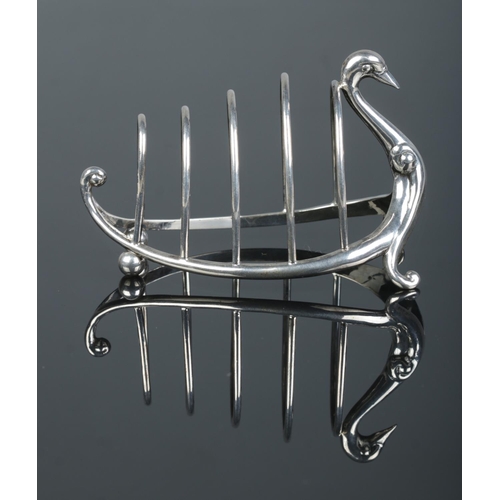 148 - A Victorian silver five bar toast rack modelled as a swan. Assayed Birmingham 1899 by William Hutton... 