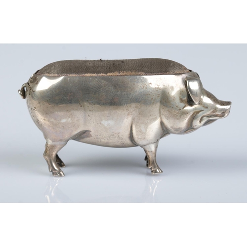 153 - An Edwardian silver pin cushion modelled as a pig. Assayed Birmingham 1905 by Adie & Lovekin Ltd. He... 