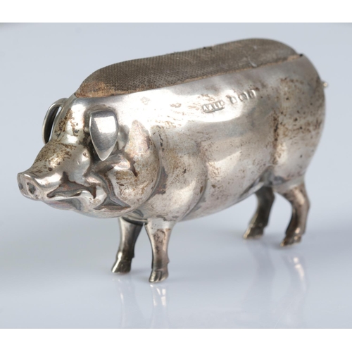 153 - An Edwardian silver pin cushion modelled as a pig. Assayed Birmingham 1905 by Adie & Lovekin Ltd. He... 