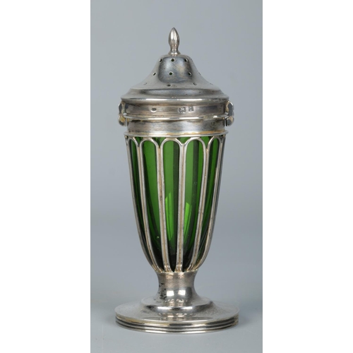 159 - An Edwardian silver pounce pot with green glass liner. Stamped Leuchars, Paris to base. Assayed Birm... 