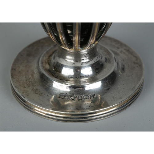 159 - An Edwardian silver pounce pot with green glass liner. Stamped Leuchars, Paris to base. Assayed Birm... 