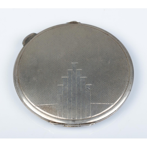 164 - A George VI Art Deco silver compact with engine turned engraved decoration. Assayed Birmingham 1937 ... 