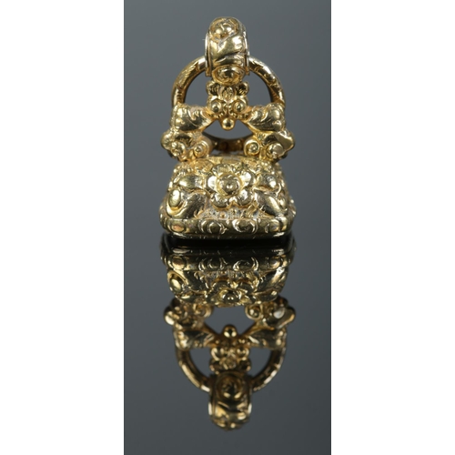 204 - A Georgian gold seal fob set with a Carnelian stone. 10.26g.