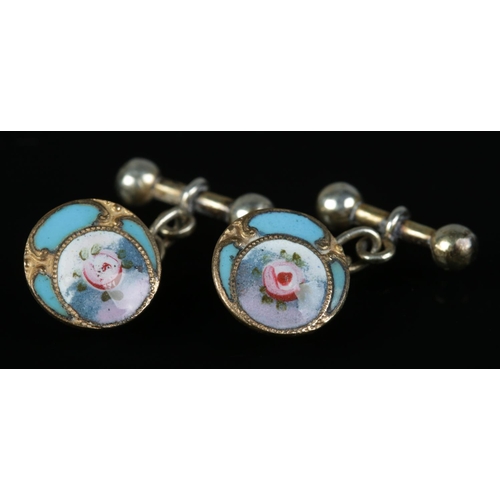 207 - Two pairs of enamelled cufflinks. Includes silver Four Vices pair decorated with scenes and items in... 