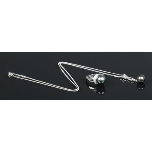 209 - A 9ct white gold and diamond Tahiti pearl ring, along with a similar pendant on 9ct white gold chain... 