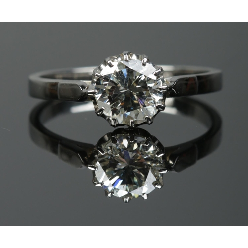214 - A platinum and diamond solitaire ring. Set with a round brilliant cut diamond. Diamond weight 1.61ct... 