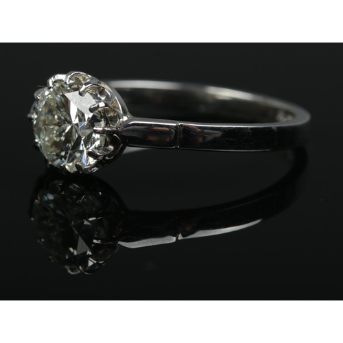 214 - A platinum and diamond solitaire ring. Set with a round brilliant cut diamond. Diamond weight 1.61ct... 