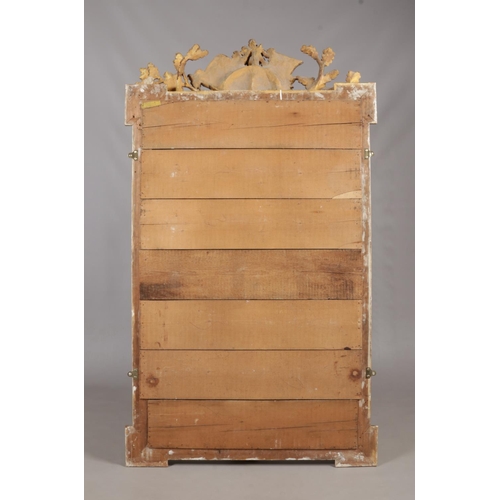 230 - A large 19th century gilt framed pier mirror. Surmounted with music sheets, drum, acanthus leaves an... 